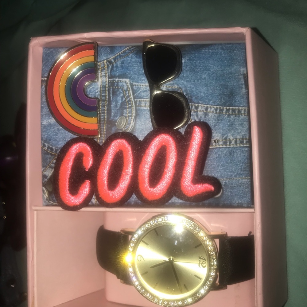a watch and pins